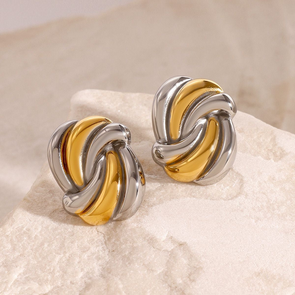 Swirl statement earrings